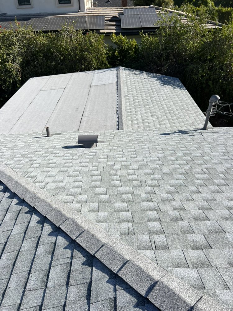 Slide of JVR Quality Roofing