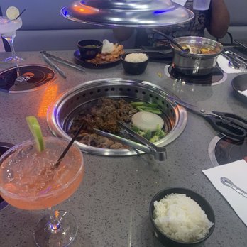Explore The Flavorful World Of Kpot Korean BBQ & Hot Pot Photos