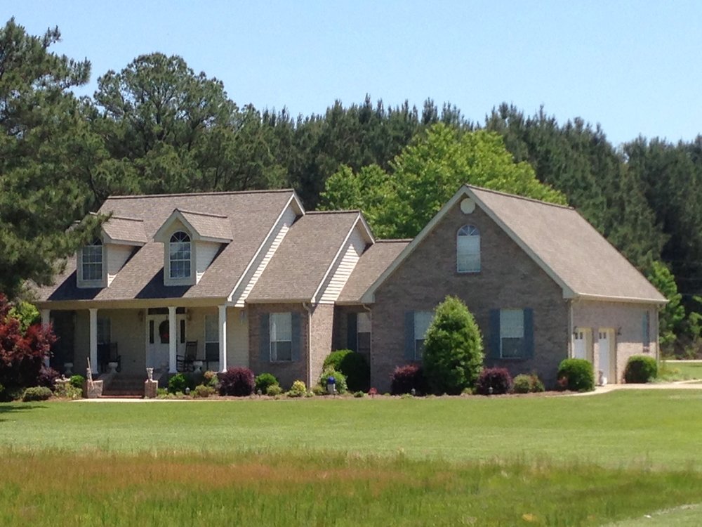 Slide of Martin Roofing