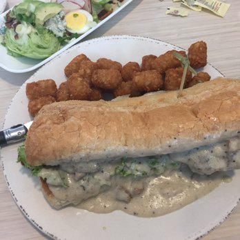 Yards Bruncheon - Fried Chicken Po'Boy with Tots - New American Near Me - Spokane, Washington Yards Bruncheon - Fried Chicken Po'Boy with Tots - New American Near Me - Spokane, Washington