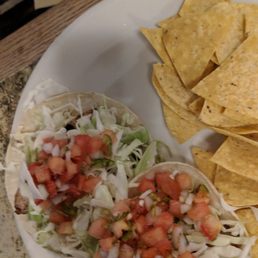 Fish tacos... They were pretty flavorless and were served with what appeared to be called salsa.
