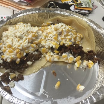 Taconooga - This is their taconooga taco. It's beef cooked with cheese and covered with Mexican corn! - Mexican Near Me - Chattanooga, Tennessee Taconooga - This is their taconooga taco. It's beef cooked with cheese and covered with Mexican corn! - Mexican Near Me - Chattanooga, Tennessee