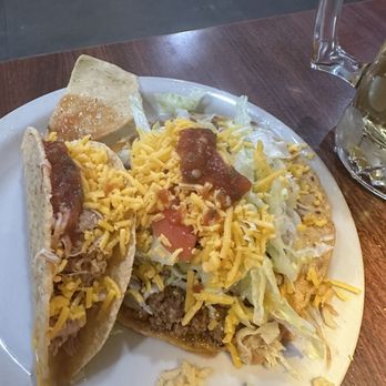La Tapatia - A shredded chicken crispy taco and a beef tostada - Mexican Near Me - Leander, Texas