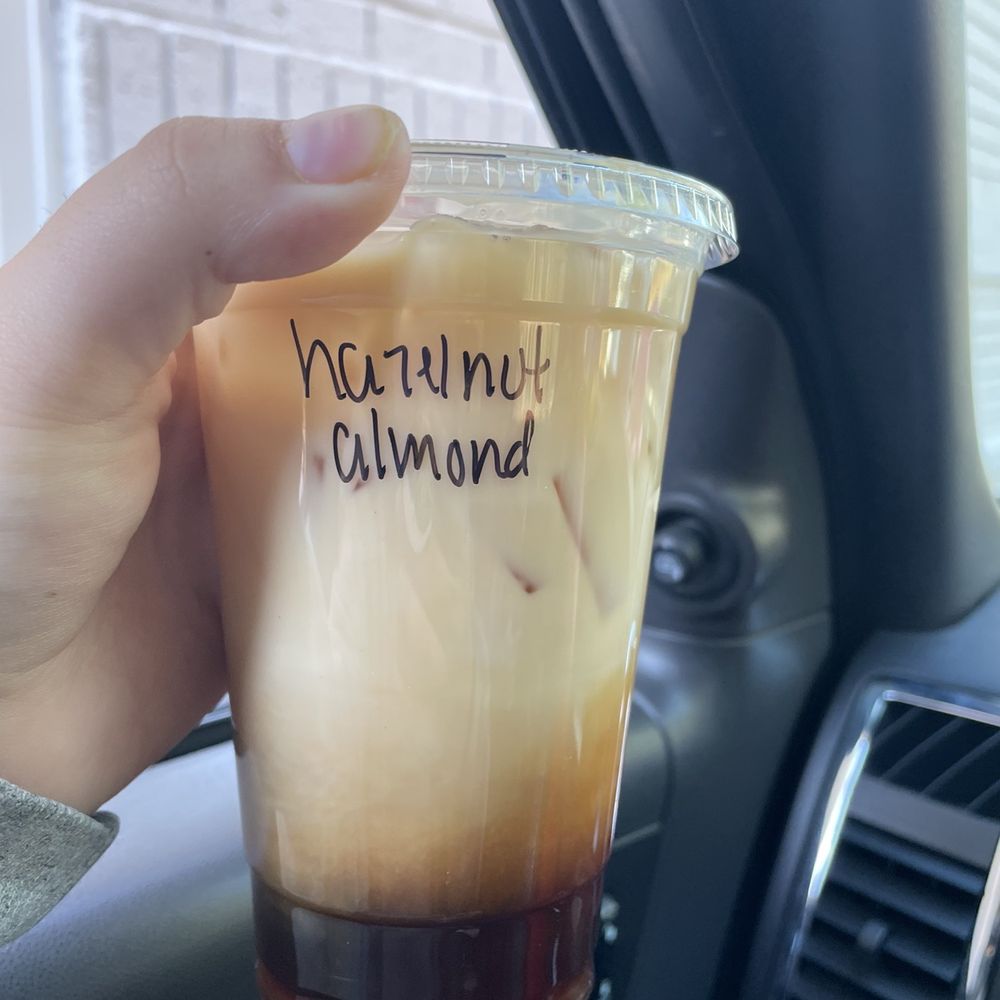 Kennesaw Coffee - Hazelnut almond milk iced latte - Coffee & Tea Near Me - Kennesaw, Georgia Kennesaw Coffee - Hazelnut almond milk iced latte - Coffee & Tea Near Me - Kennesaw, Georgia