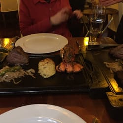Puerto Madero - Tenderloin and lobster tail with potatoes and onions/peppers.