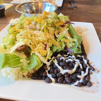 Blue Agave Grill - Mango fish tacos, picture has allot going on but very tasty, crisp fish, wrapped in lettuce wraps and great salsa and sides - Seafood Near Me - Fort Collins, Colorado