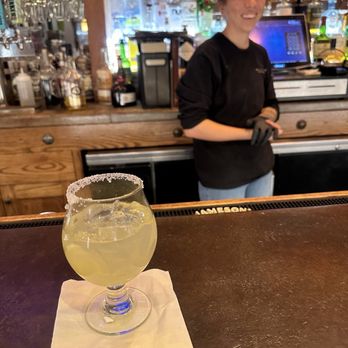 The Ranch House - Bar area, with Arial, looking at her smile to all the customers - American Near Me - Santa Fe, New Mexico
