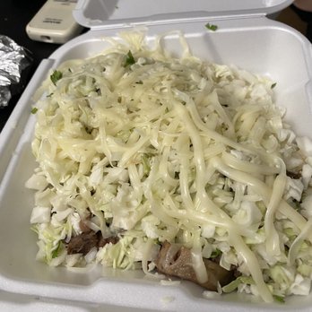 Boca Del Rio - Under this pile of cheese and cabbage are 3 lengua tacos - Mexican Near Me - La Puente, California Boca Del Rio - Under this pile of cheese and cabbage are 3 lengua tacos - Mexican Near Me - La Puente, California