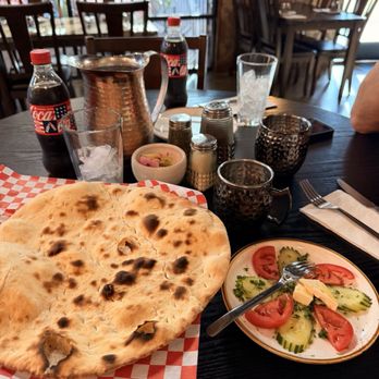 Tah Deeg Persian Cuisine - Fresh Barbari Bread (Nan-e Barbari) with Sabzi Khordan - Persian/Iranian Near Me - Clovis, California Tah Deeg Persian Cuisine - Fresh Barbari Bread (Nan-e Barbari) with Sabzi Khordan - Persian/Iranian Near Me - Clovis, California
