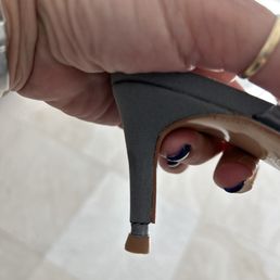 You can see where my husband cut the fabric.  You can see where Dan PAINTED the grey paint and stuck the brown heal end on.