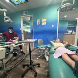Smiling Sea Pediatric Dentistry - Dentist in action