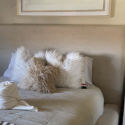 HomeGoods - Framed picture and partial image of throw rug.