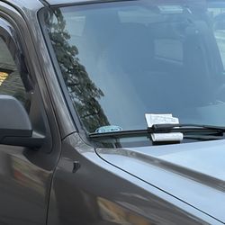 US Post Office - Someone got a ticket at 6:50pm (meters are in effect until 7)