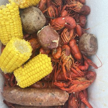 Hans' Crawfish Services - 10 lbs of crawfish and they gave us 4 each of corn and potato and a cooler to keep it all in. - Cajun/Creole Near Me - Tomball, Texas