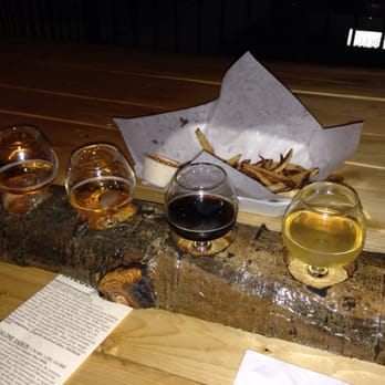 Arizona Wilderness Brewing - Sampler and duck fat fries - Breweries Near Me - Gilbert, Arizona
