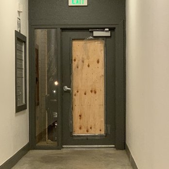 Uptown Square Apartment Homes by Pinnacle - Boarded up door after someone threw a rock through it to get in.... - Apartments Near Me - Denver, Colorado Uptown Square Apartment Homes by Pinnacle - Boarded up door after someone threw a rock through it to get in.... - Apartments Near Me - Denver, Colorado