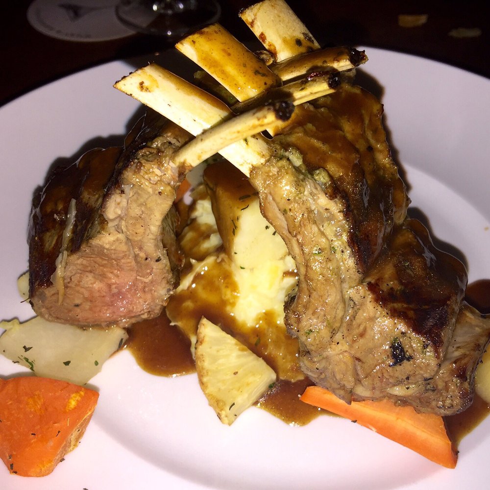 Seasons 52 - The Rack of Lamb. Tasty! I recommend you have it medium. Easier to get off the bone. - New American Near Me - Schaumburg, Illinois