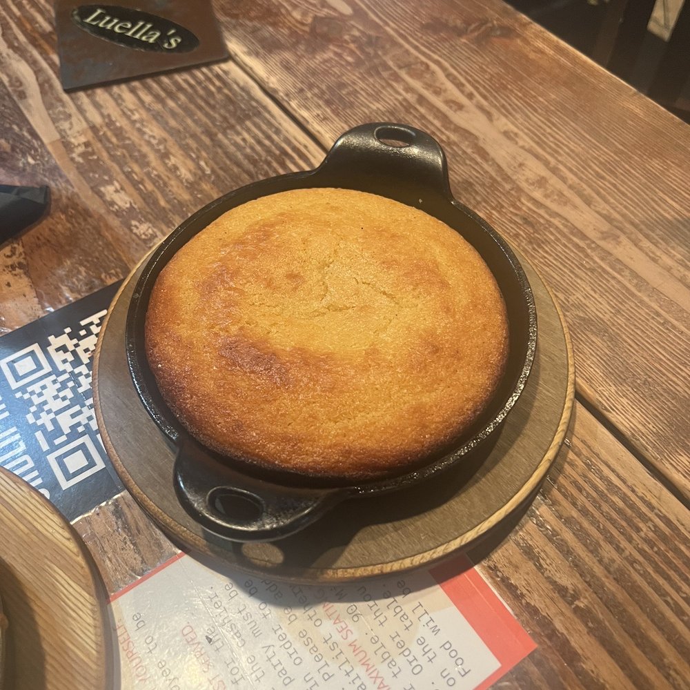 Luella's Southern Kitchen - Skillet Cornbread with Honey Butter - Southern Near Me - Chicago, Illinois Luella's Southern Kitchen - Skillet Cornbread with Honey Butter - Southern Near Me - Chicago, Illinois