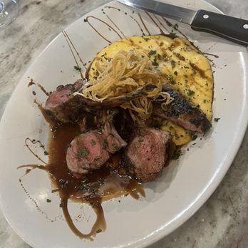2 Twelve Seasonal Kitchen + Bar - Herb Crusted Rack of Lamb New Zealand rack of lamb, creamy Parmesan polenta, ratatouille, balsamic reduction - Wine Bars Near Me - Mebane, North Carolina