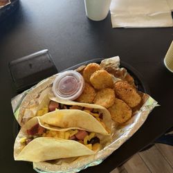 Bologna, egg, cheese breakfast tacos w/ hash browns. Very good.
