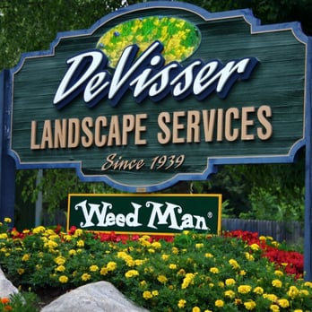 Weed Man - sign for delvison landscaping services - Pest Control Near Me - Kalamazoo, Michigan