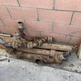 Rapid Action Rooter - More of the pipes that were removed from deep underground - someone had attached electrical piping (according to Mandel) to the pipes! - Plumbing Near Me - Hawthorne, California Rapid Action Rooter - More of the pipes that were removed from deep underground - someone had attached electrical piping (according to Mandel) to the pipes! - Plumbing Near Me - Hawthorne, California