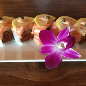 Sushi One Spot - Sakura roll (spicy tuna, cucumber, gobo, salmon, sliced lemon on top) - Sushi Bars Near Me - Montclair, California Sushi One Spot - Sakura roll (spicy tuna, cucumber, gobo, salmon, sliced lemon on top) - Sushi Bars Near Me - Montclair, California