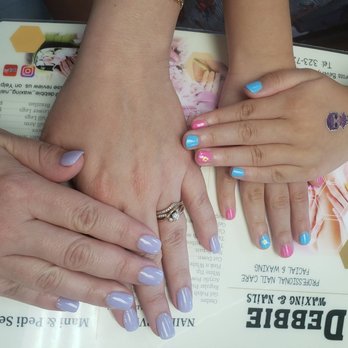Debbies Waxing & Nails - Mine are powder dip and my daughter's are regular nail polish. - Nail Salons Near Me - Montebello , California
