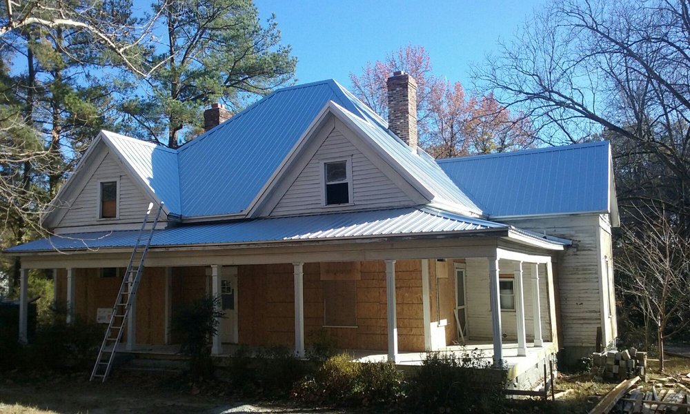 Slide of Tim's Roofing