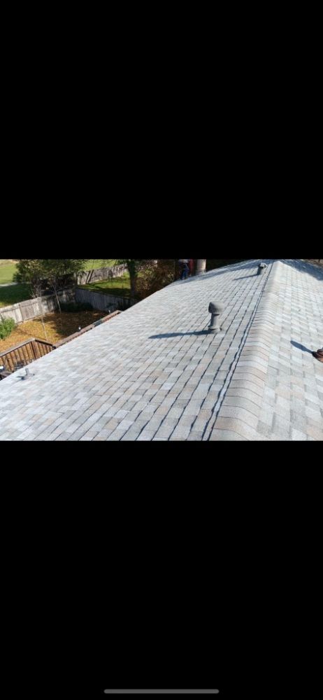 Slide of Hired Guns Roofing & Restoration