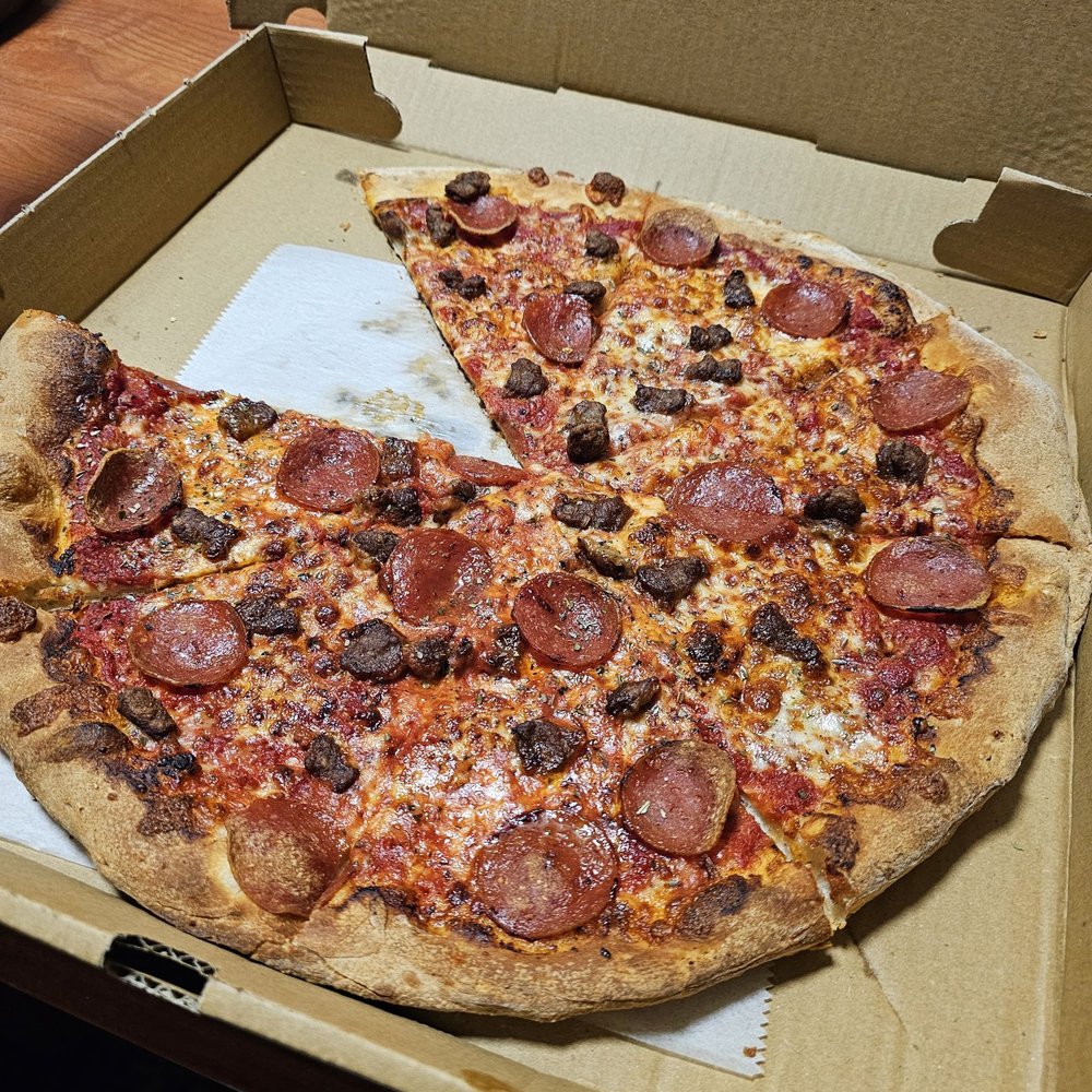 Pizza two toppings it was a bread sticks but had to pay for toppings because the deal is a cheese pizza and bread sticks