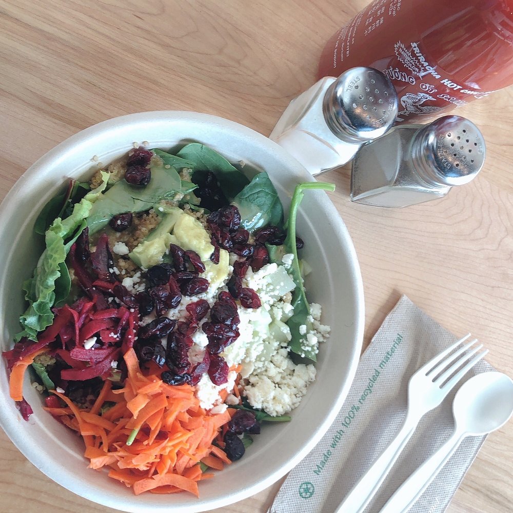 freshii market salad: field greens and spinach, quinoa, avocado, beet slaw, apples, dried cranberries, carrots, honey dijon dressing. freshii market salad: field greens and spinach, quinoa, avocado, beet slaw, apples, dried cranberries, carrots, honey dijon dressing.