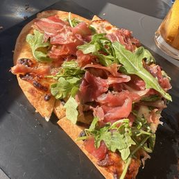 half of the Brie and fig flatbread which half of the Brie and fig flatbread which