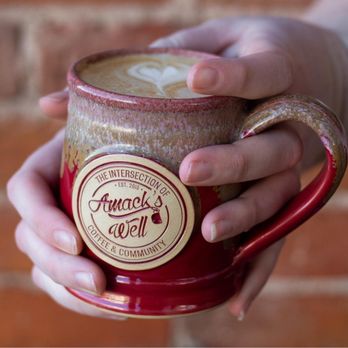 Amack's Well - a person holding a cup of coffee - Coffee & Tea Near Me - Batesville, Indiana