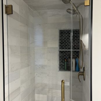 Cornerstone Tile & Marble - a walk in shower - General Contractors Near Me