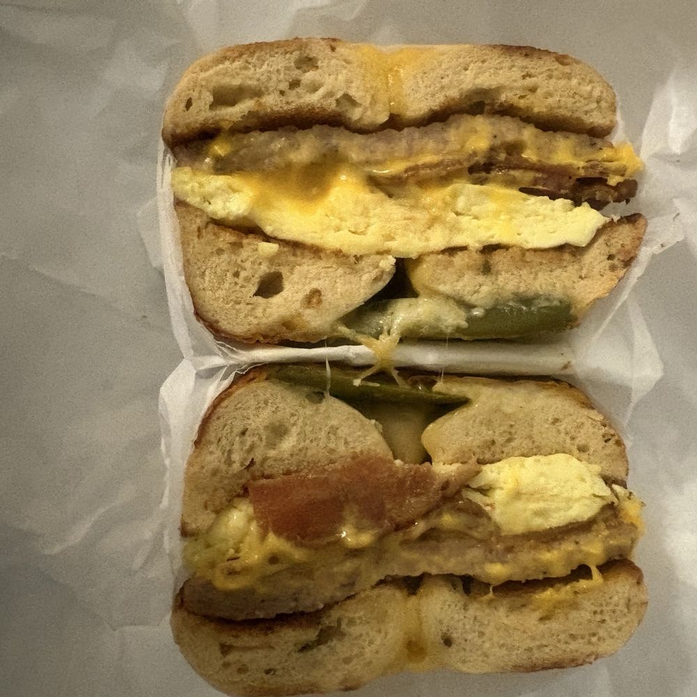 Delicious Donuts and Bagels - Bacon, sausage, egg, cheddar on jalapeño cheese bagel. - Donuts Near Me - Newark, California Delicious Donuts and Bagels - Bacon, sausage, egg, cheddar on jalapeño cheese bagel. - Donuts Near Me - Newark, California