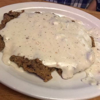 Texas Roadhouse - Country Fried Steak. The sauce was a bit salty but was good - Steakhouses Near Me - Tupelo, Mississippi Texas Roadhouse - Country Fried Steak. The sauce was a bit salty but was good - Steakhouses Near Me - Tupelo, Mississippi
