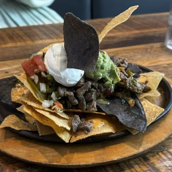 The Local Bar - Sizzling Beef Nachos - Sports Bars Near Me - Cypress, Texas