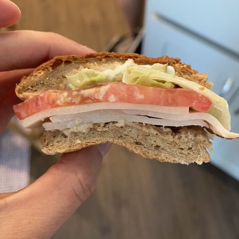 John & Mary's - a person holding a sandwich - Pizza Near Me - Hamburg, New York John & Mary's - a person holding a sandwich - Pizza Near Me - Hamburg, New York