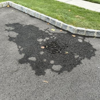 Economy Asphalt & Roofing - Cracked spot - Roofing Near Me - Edison, New Jersey