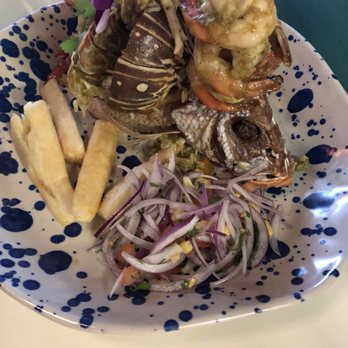 La Perla - Snapper stuffed with cilantro rice, scallops, and lobster. Wow! - Seafood Near Me - Weston, Florida La Perla - Snapper stuffed with cilantro rice, scallops, and lobster. Wow! - Seafood Near Me - Weston, Florida