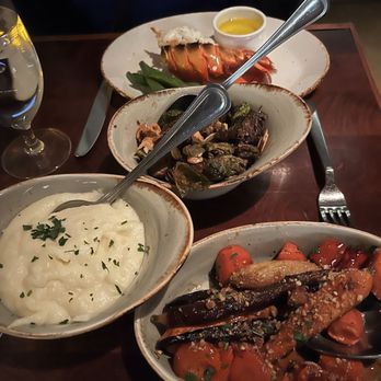 American Bar & Grille - Garlic, mashed potatoes, candied, carrots, lobster tail, and brussels sprouts. - American Near Me - Atlantic City, New Jersey
