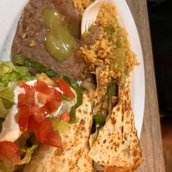 Tacos La Estrella - Quesadilla fajita steak. With little salad, rice & beans