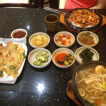 Ka Chi - Spicy Seafood udon hotpot with various side dishes, seafood pancake appetizer and seafood udon soup - Korean Near Me - Toronto, Ontario