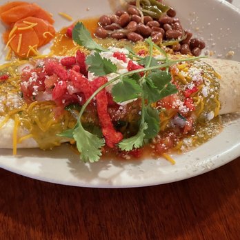 Storm Castle Cafe - Vaquero: Breakfast burritos with a little hot Cheetos garnish. - Breakfast & Brunch Near Me - Bozeman, Montana Storm Castle Cafe - Vaquero: Breakfast burritos with a little hot Cheetos garnish. - Breakfast & Brunch Near Me - Bozeman, Montana