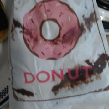 Jupiter Donuts - She stuffed 4 donuts in one bag most of the frosting came off and onto the bag...hate that - Donuts Near Me - Jupiter, Florida