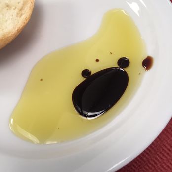 Eatalian - They place bottles of Olive oil and Balsamic on the table-a nice touch! - Italian Near Me - Gardena, California Eatalian - They place bottles of Olive oil and Balsamic on the table-a nice touch! - Italian Near Me - Gardena, California