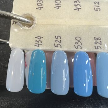 Jennie's Nails - Some of their blue polish options. Most colors come in a regular nail polish formula as well as a gel formula. - Nail Salons Near Me - San Bruno, California Jennie's Nails - Some of their blue polish options. Most colors come in a regular nail polish formula as well as a gel formula. - Nail Salons Near Me - San Bruno, California