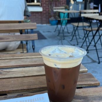 Paper Son Coffee - a cup of coffee on a wooden table - Coffee & Tea Near Me - San Francisco, California Paper Son Coffee - a cup of coffee on a wooden table - Coffee & Tea Near Me - San Francisco, California