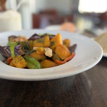 Something Vegan - a plate of vegetables on a table - Asian Fusion Near Me - Burbank, California Something Vegan - a plate of vegetables on a table - Asian Fusion Near Me - Burbank, California